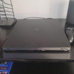 Slim black PlayStation 4